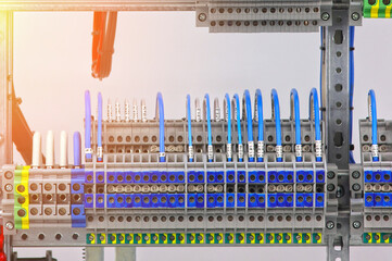 Electrical pass-through terminals for connecting copper mounting wires in an electrical distribution cabinet.Sunflare.