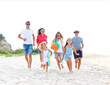 © Dasha Petrenko - Group of young people with kids on the beech