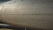 riveted plating of the hull of a military aircraft