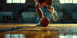 Dynamic Basketball Court Action Close-Up. Basketball player male legs and the ball on a hardwood court, capturing the motion and energy of the game.