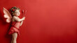Cupid with bow on a beautiful red background for Valentine's Day	
