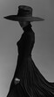 A woman in a black dress and a large hat