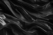 graphite plastic background. crumpled and draped textured cellophane material