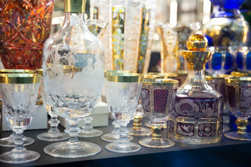 Wall Mural - Variety of glassware and souvenirs from famous Bohemian crystal on showcase of boutique..