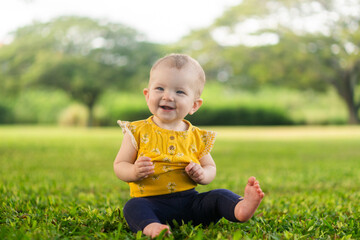 a happy baby outside 