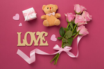 Wall Mural - Pink roses with hearts and gifts on color background, top view. Valentines day concept