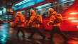 A group of firefighters on the move in the evening