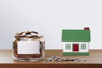 Sticker - Real estate background. Coins and House model