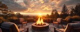 Fototapeta  - Luxurious chairs and cozy fire pit at a breathtaking sunset