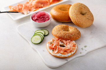 Wall Mural - Bagels served with cream cheese and smoked salmon, sesame lox bagels