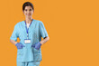 © Pixel-Shot - Female medical intern on yellow background