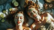 © Naknakhone - Two girls make homemade face and hair beauty masks. Cucumbers for the freshness of the skin around the eyes. Women take care of youthful skin. cute couple concept.
