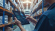 Smart Warehouse,Inventory management system concept.Manager using digital tablet,showing warehouse software management dashboard