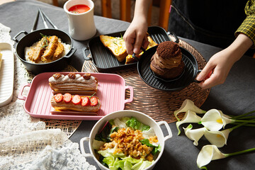 Canvas Print - Salads and desserts on the table	