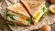 © vefimov - Egg, Lettuce, Tomato, and Cheese Sandwich