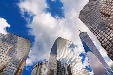 Wall Mural - New York skyscrapers, modern office buildings in business district against blue sky bottom view, New York city skyline, USA

