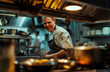 © TimosBlickfang - smiling cook working in the kitchen