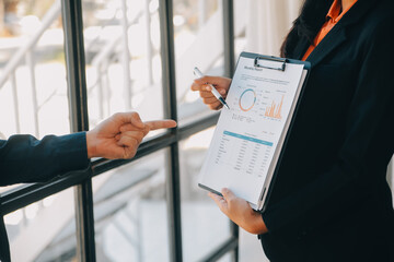 Co working conference, Business team meeting present, investor colleagues discussing new plan financial graph data on office table with laptop and digital tablet, Finance, accounting, investment.