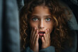 Little girl covering her mouth with her hands. Portrait of afraid or scared little girl, family abuse relationship, parent abuse, bullying at school, anxiety child.