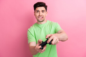 Sticker - Portrait of stressed young man have fun free time gamer bite lips nervous competition cant complete level isolated on pink color background