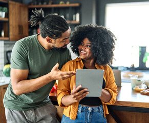 Wall Mural - kitchen couple woman man food together cooking preparation ingredient laptop recipe internet computer happy love preparing eating home dinner vegetable relationship boyfriend girlfriend