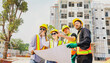 © ฺฺฺBoonterm - Team architects multi ethnic workers men and women meeting brainstorming construction of condominium buildings civil engineers examining blueprints giving advice planning projects housing real estate.