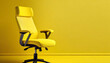 Yellow office chair on a yellow background.