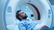 © cherezoff - Man in MRI scanner in hospital