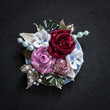 Textile brooch with embroidered flowers