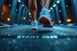 Close-up view of an individuals feet on a treadmill track marked with START 2025, symbolizing the beginning of a new years fitness journey.