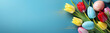  Tulpen und Ostereier auf blauem Hintergrund