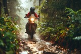 Fototapeta  - Motorcyclist riding on a dirt road in the rain forest. Motocross. Enduro. Extreme sport concept.