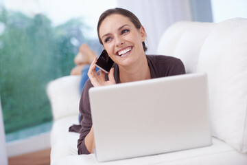 Canvas Print - Happy woman, phone call and laptop on sofa for remote work in communication or social media. Virtual, contact and person relax in home with networking on computer online and talking on smartphone