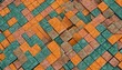  a close up of a pattern of orange, green and brown tiles on a tile floor that looks like it has been made out of small squares and rectangles.