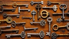  A Bunch Of Keys That Are Sitting On A Wooden Table With One Key In The Middle Of The Keyhole And The Other In The Middle Of The Keyhole.