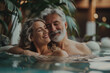 © fabioderby - Happy mature couple in love, spa hot tub, senior romantic relax