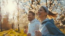 Close-up Portrait Of Happy White Couple Jogging Together Among The Spring Trees, Generative AI