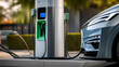 EV charging station for electric car in concept of green energy and eco power produced from sustainable source to supply to charger station in order to reduce CO2 emission