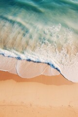  Aerial shot of sandy beach waves creating shoreline textures