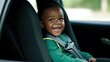 The happy child's infectious smile brightens up the car, spreading happiness and warmth from their snug child seat