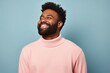 © CogniLens - Portrait of a joyful man in his 30s wearing a cozy sweater against a solid pastel color wall. AI Generation