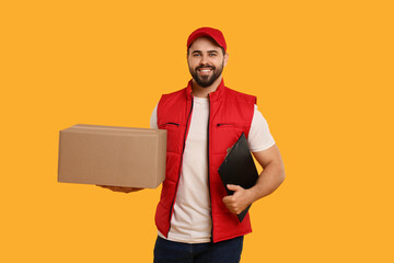 Sticker - Happy young courier with parcel and clipboard on orange background