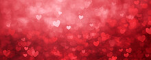 Valentine's Day Abstract Background With Red Hearts Bokeh Defocused Lights.Romantic Red Bokeh Background With Hearts For Valentine's Day Celebration And Christmas Decoration.