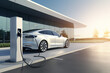 Electric car is charged from a charging station that takes energy from solar panels.