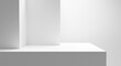 © Hanna - Blank white podium platform for product placement and design, empty space white table with bright light isolated on white wall, empty gray gradient room with blank podium, abstract forms background