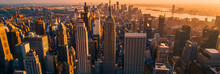 Sunset Aerial View Of Empire State Building Spire And A Top Deck Tourist Observatory. New York City Business Center From Above. Helicopter Image Of An Architectural Wonder In Midtown Manhattan