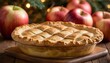 Classic apple pie with an intricate lattice crust on a wooden table