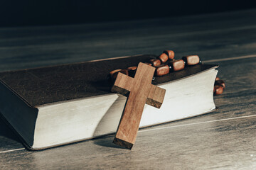 Poster - Holy Bible and wooden cross on table