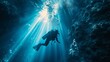 Scuba diver descending into the depths with a powerful underwater flashlight, creating a beam of light. [Scuba diver descending with underwater flashlight