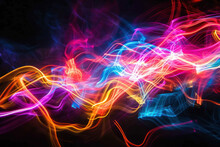 Abstract Light Painting Of Multiple Glowing Neon Colors, With A Chaotic Squiggle Pattern That Trails Off Toward The Right Edge Of The Image